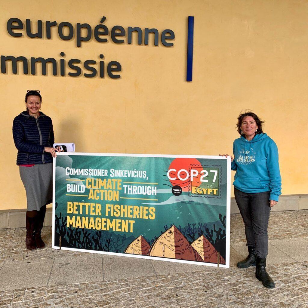 Carmen Preising, Deputy Head of Cabinet to the European Commissioner for Environment, Oceans and Fisheries receives the COP27 Postcard from Our Fish Programme Director Rebecca Hubbard at the European Commission, Brussels, 8 November 2022.